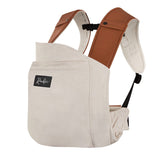 Vue de côté du système de bretelles très pratique du porte-bébé design Rookie Baby Revolution